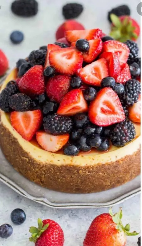 Cheesecake topped with fresh berries