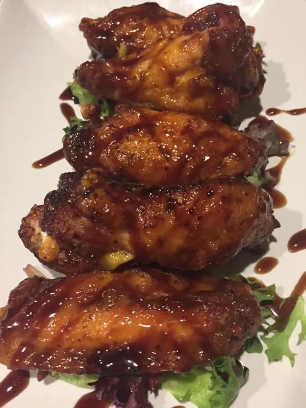 Nick's house wings glazed and plated